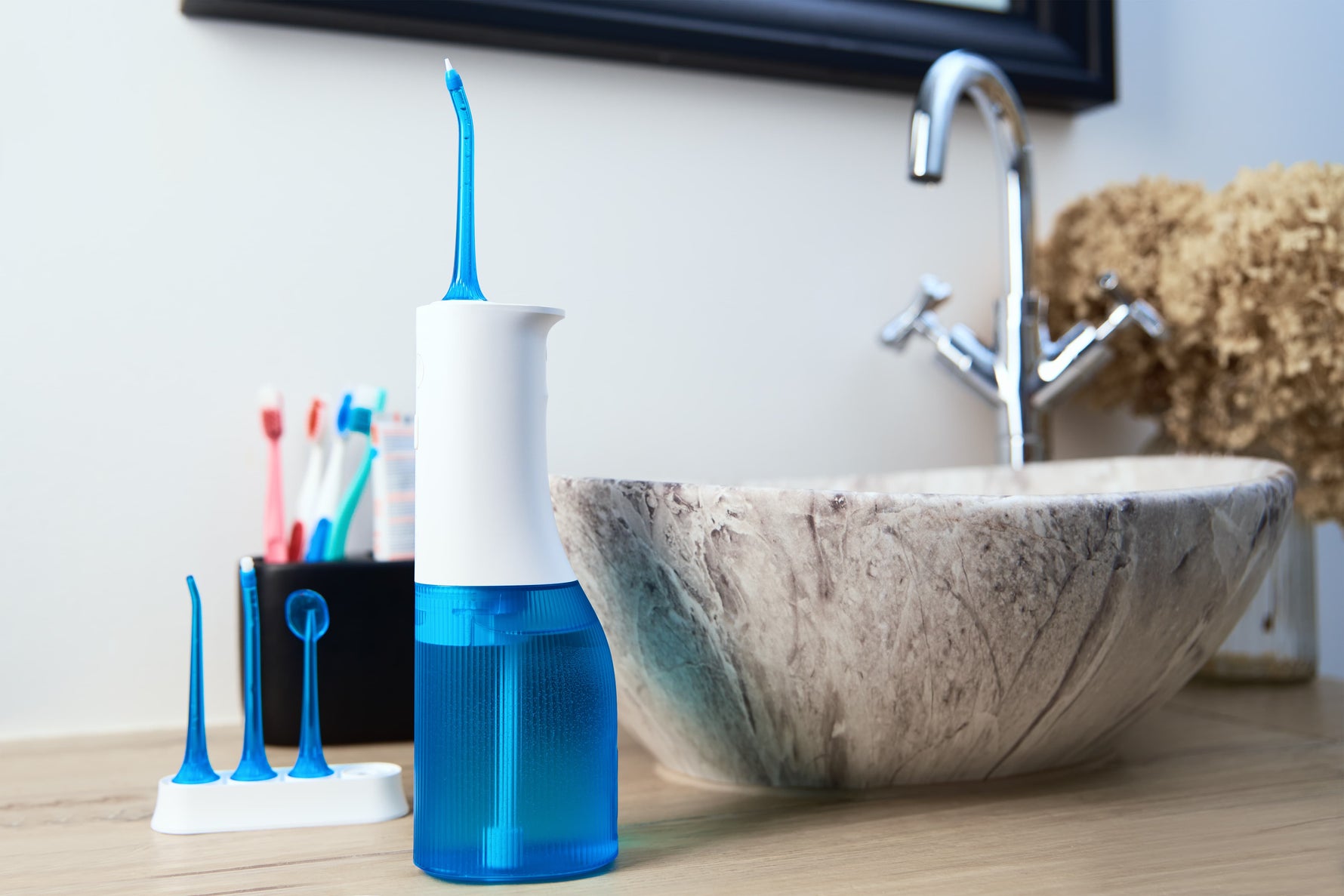 Floss vs Water Flosser: Which Is Better for Your Teeth and Gums?