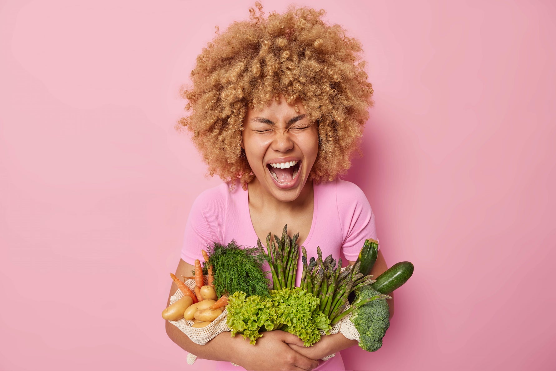 woman-carrying-healthy-vegetables