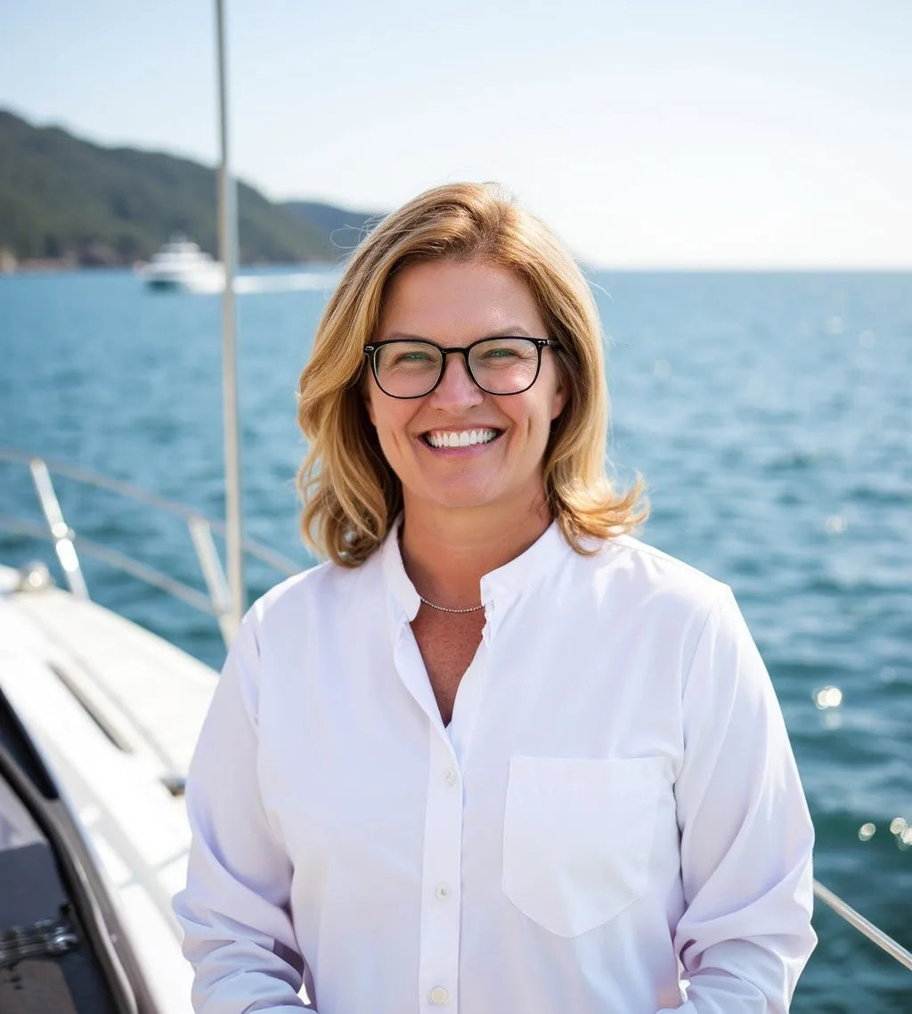 Dr. Jen smiling on a boat