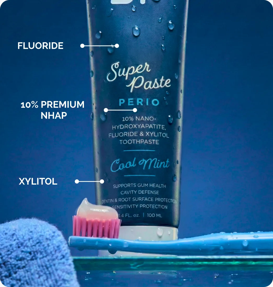 Super Paste Perio tube labelled with its three key ingredients: fluoride, 10% premium nHAp and xylitol