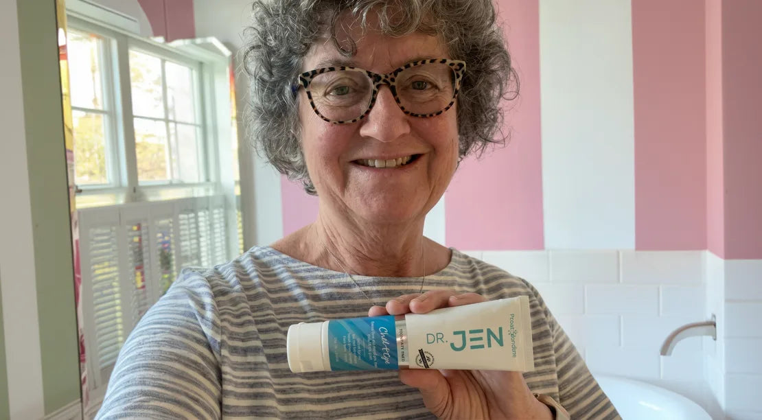 Customer holding Dr. Jen's toothpaste